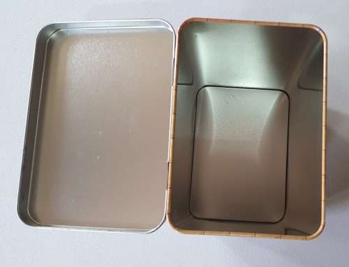Nibbles tin as per photos
