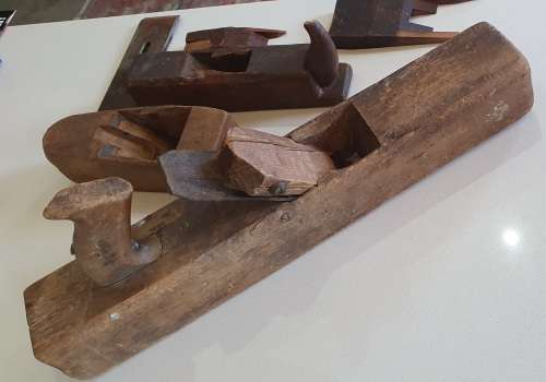 Vintage wooden hand plane and other wooden plane parts, as per photo.