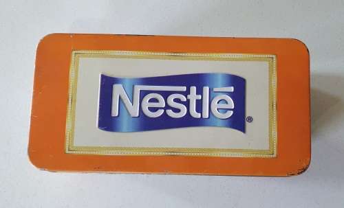 NESTLE treat tin as per photos