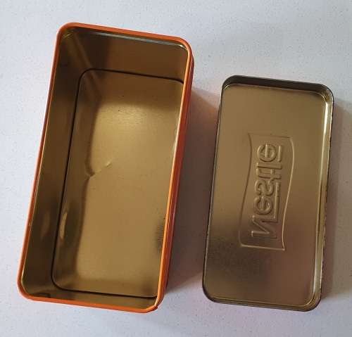 NESTLE treat tin as per photos