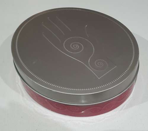 Red and silver tin as per photos