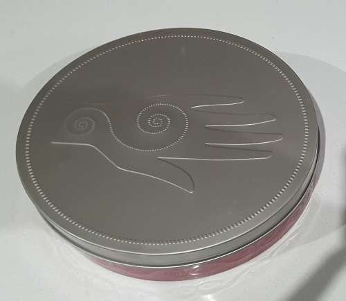 Red and silver tin as per photos