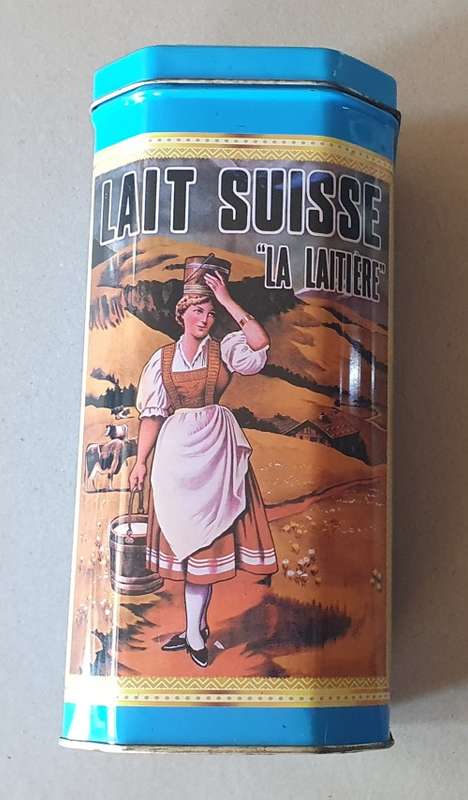 NESTLE tin as per photos
