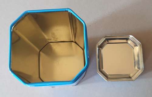 NESTLE tin as per photos