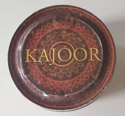 Dented KAJOOR tin as per photos
