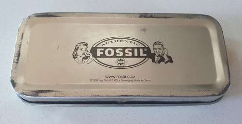 FOSSIL tin as per photos