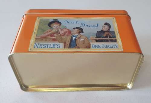 NESTLE tin as per photos
