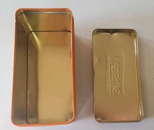 NESTLE tin as per photos