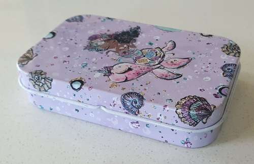 Small tin as per photos