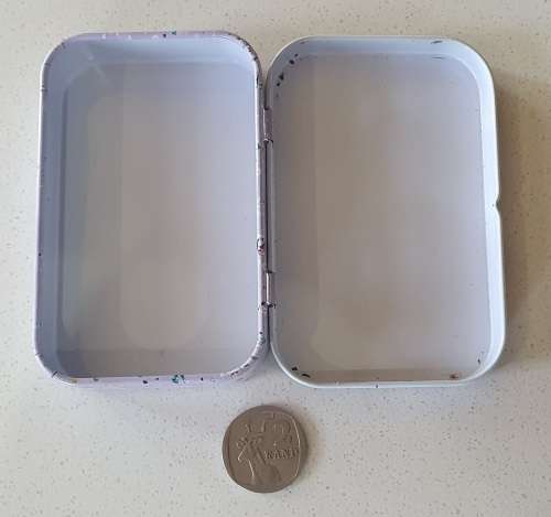 Small tin as per photos