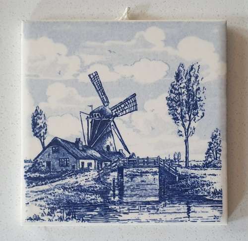 Delft Blue hand painted tile - made in England as per photo.