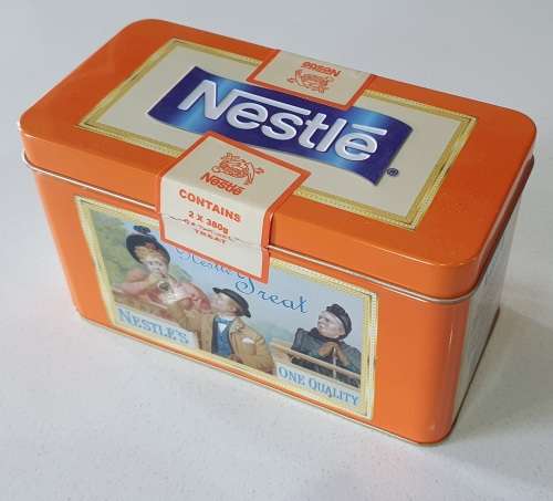 NESTLE treat tin as per photos