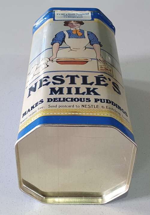 NESTLE MILK tin as per photos