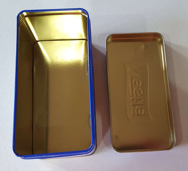 NESTLE milk tin as per photos