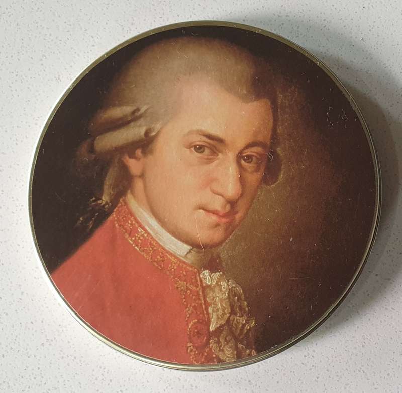 Wolfgang A. Mozart tin as per photos