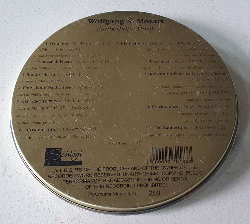 Wolfgang A. Mozart tin as per photos