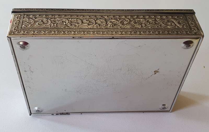 LARGE embossed tin as per photos