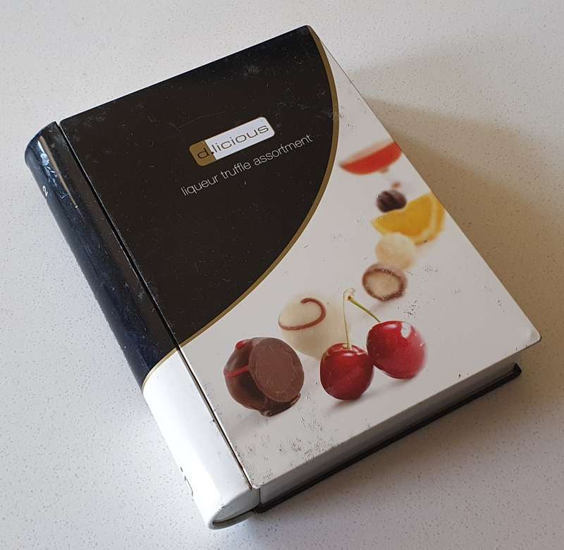 D.licious liqueuer truffle book tin as per photos
