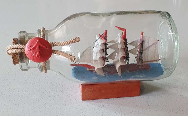 Ship in glass bottle as per photos
