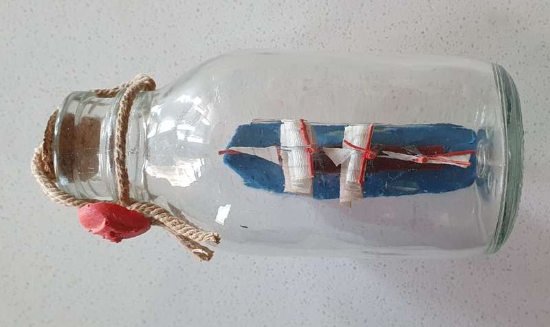 Ship in glass bottle as per photos