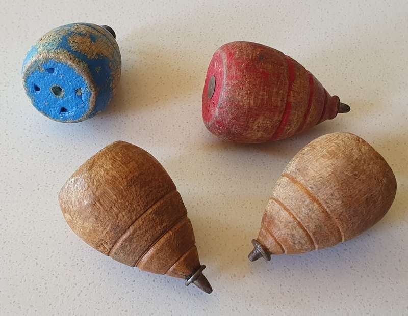 4 Vintage wooden spinning tops as per photos