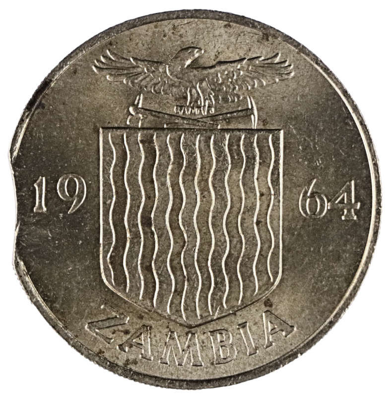 Error 1964 Zambia 2 Shillings clipped planchet