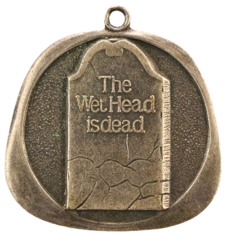 1975 Gillette The Wet Head is dead, Long live the Dry Look Hairspray Advertising Token