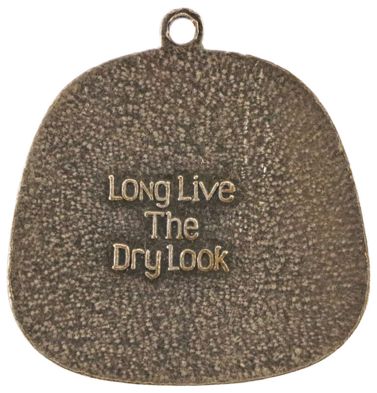 1975 Gillette The Wet Head is dead, Long live the Dry Look Hairspray Advertising Token