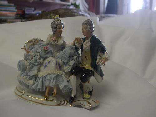 Gold rimmed Vintage Old Porcelain Lace Dresden couple sitting on bench Figurine