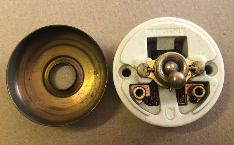 Crabtree porcelain and brass light switch