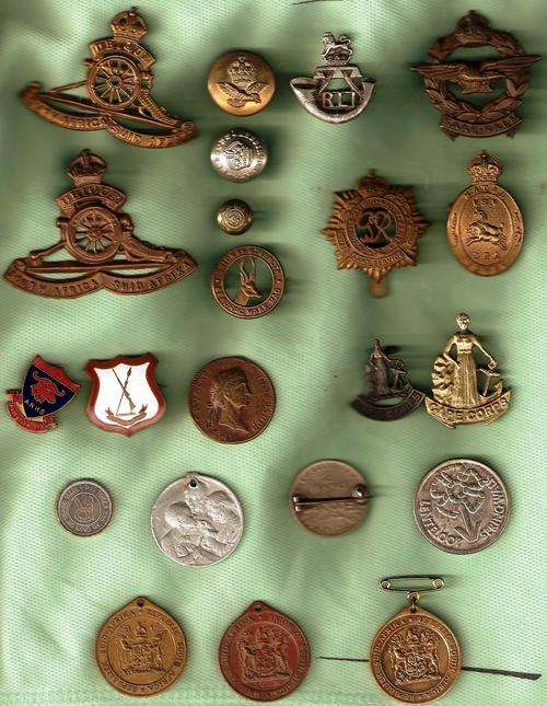 Badges, buttons, tokens, medalions and even a coin Broach