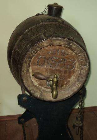 LOVELY OLD OAK BARREL WITH TAP on a stand