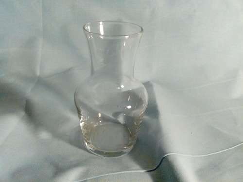 I  HAVE A WONDERFUL GLASS CARAFE - NO CHIPS OR CRACKS - REAL NICE PIECE!!