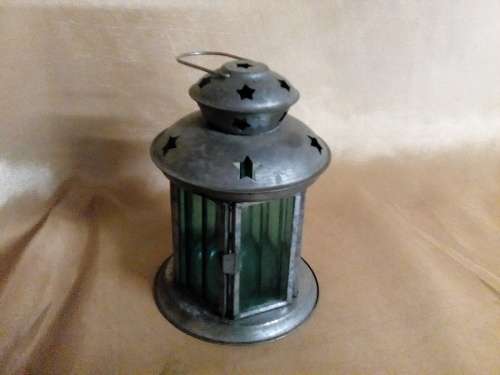 I HAVE A BEAUTIFUL STEEL AND GLASS TEALIGHT HOLDER - SUCH A NICE PIECE!!!
