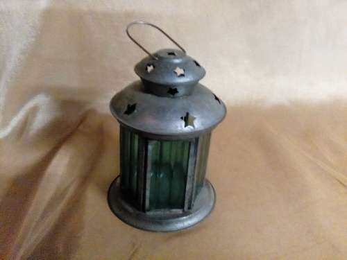 I HAVE A BEAUTIFUL STEEL AND GLASS TEALIGHT HOLDER - SUCH A NICE PIECE!!!