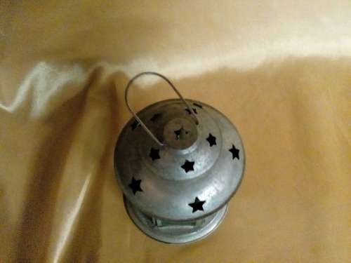 I HAVE A BEAUTIFUL STEEL AND GLASS TEALIGHT HOLDER - SUCH A NICE PIECE!!!