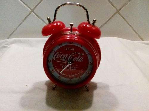 I HAVE A STUNNING COCA-COLA CLOCK - BATTERY OPERATED - GREAT ADDITION TO YOUR COCA-COLA COLLECTION!!
