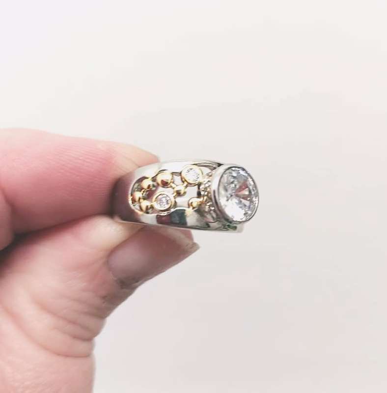 Silver Fashion Ring with Yellow Gold Detail and White Cubic Zirconias