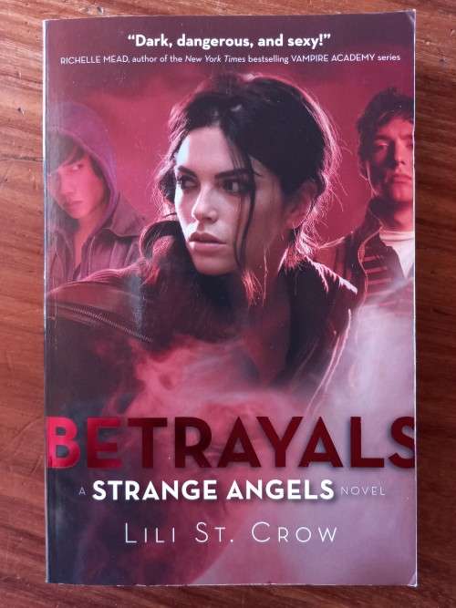 Betrayals (Strange Angels #2) by Lili St. Crow