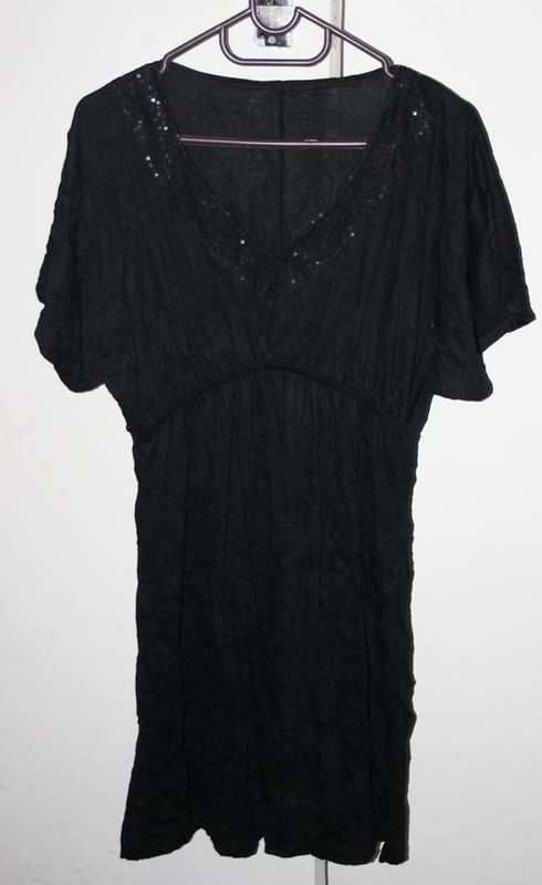 Stunning Dress with sequinced neckline