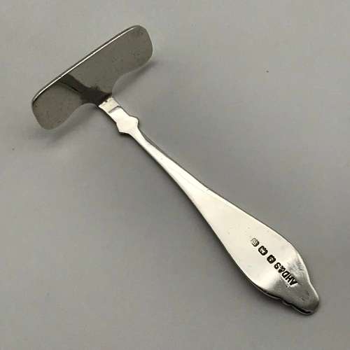 Early Sterling Silver `Stork` Baby Food Pusher