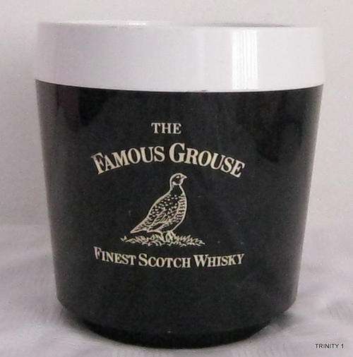 THE FAMOUS GROUSE FINEST SCOTCH WHISKY ICE BUCKET(+-20CM LONG,+-18CM IN DIAM,+-17CM DEEP)