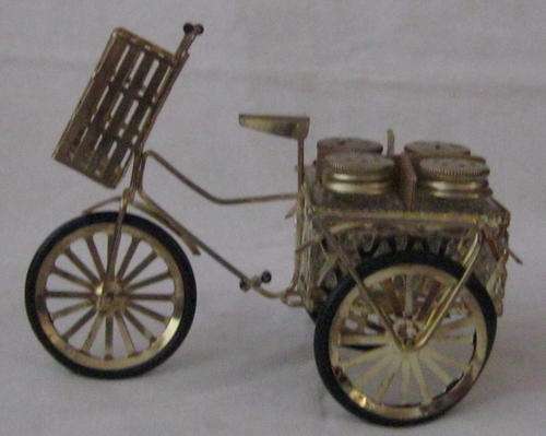 METAL AND PLASTIC WAGON WITH SALT AND PEPPER SHAKERS