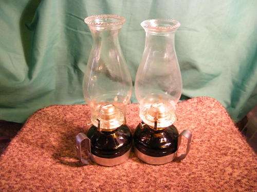 Dark green oil lamps (as good as new).