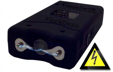 **2.8MIL STUN GUN WITH BUILT IN RECHARCHABLE BATTERY, TORCH & HOLSTER* (10 UP FOR GRABZ)
