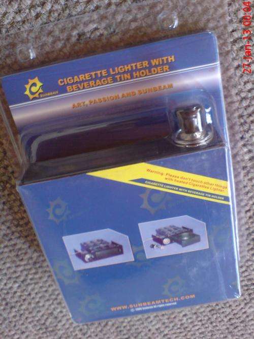 **CIGARETTE LIGHTER WITH BEVERAGE TIN HOLDER 5.25 BAY**