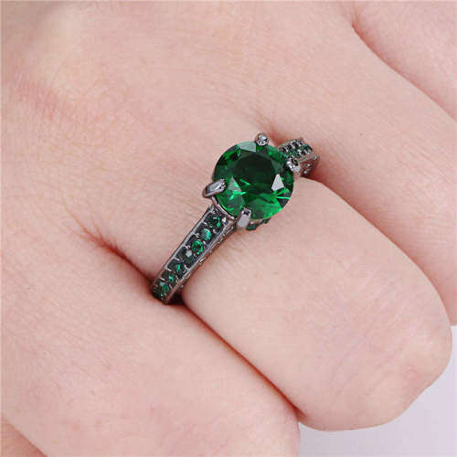 Bewitching 10KT Black Gold Filled Ring With Simulated Emeralds Size 6 US