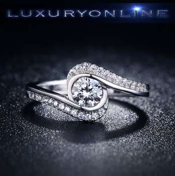 White Gold Filled Ring With 27 Simulated Diamonds