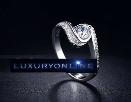 White Gold Filled Ring With 27 Simulated Diamonds