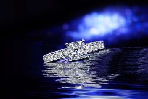 LOVELY! Ring With 15 Hand Crafted Simulated Diamonds Size 6; 7 US